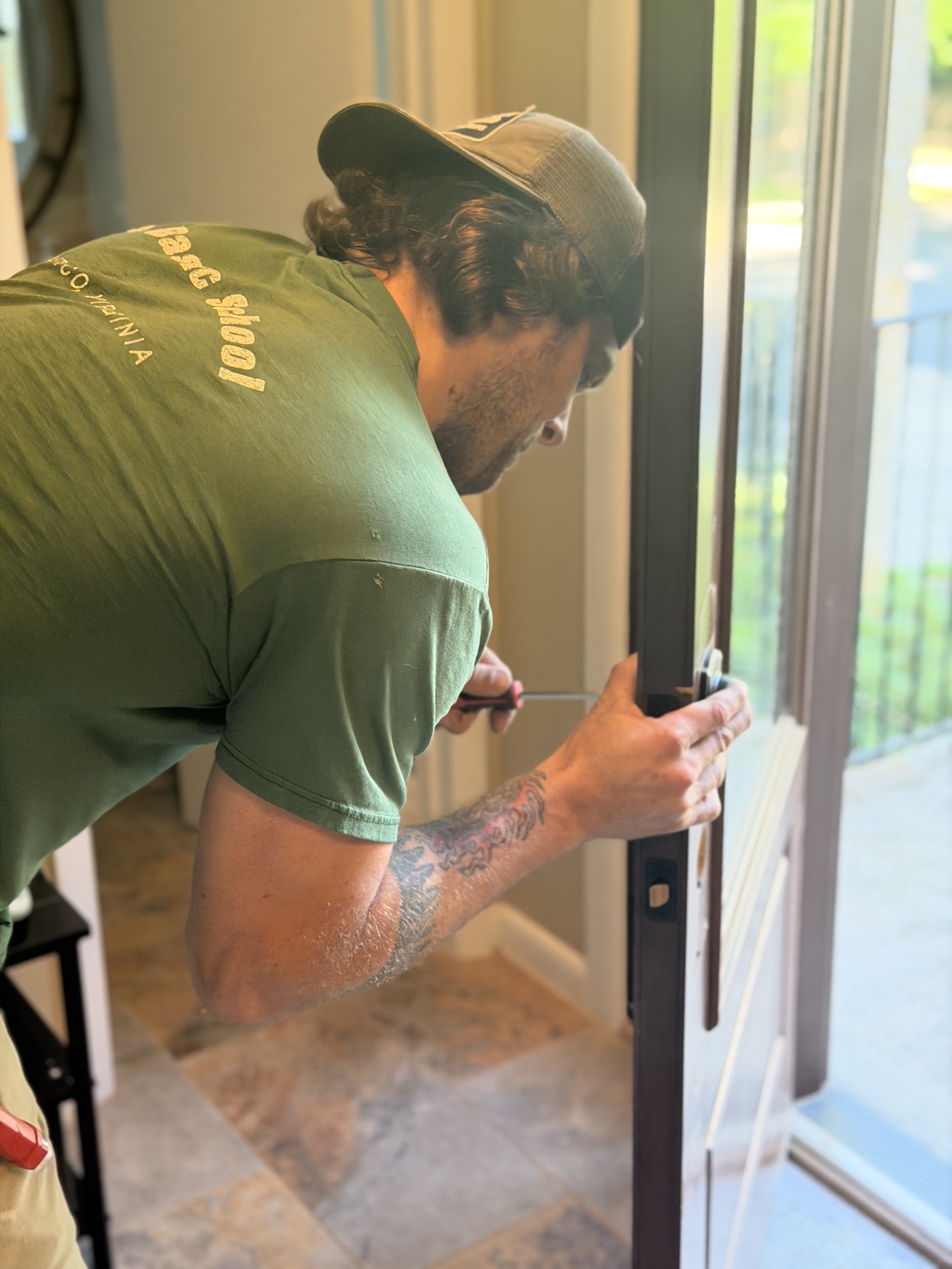 Veteran handyman repairing a stair railing in Northern Virginia